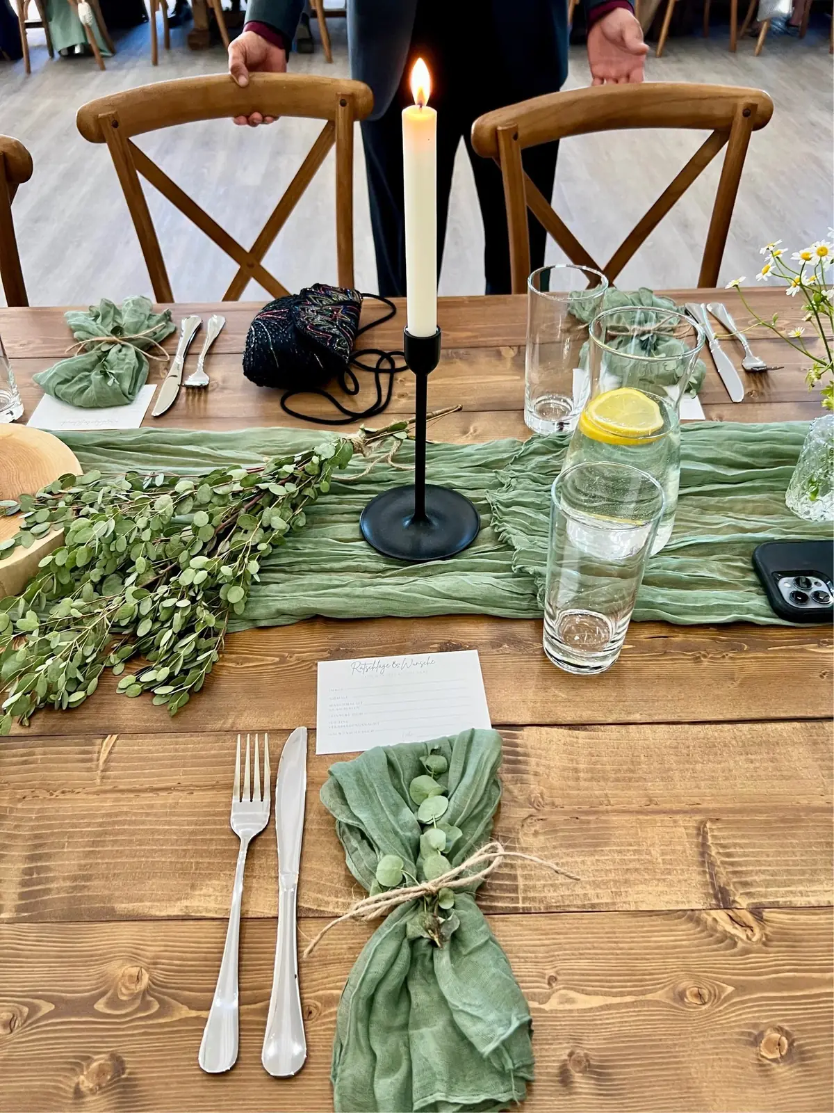 China and cutlery from the hall on a table dressed by the people who booked it